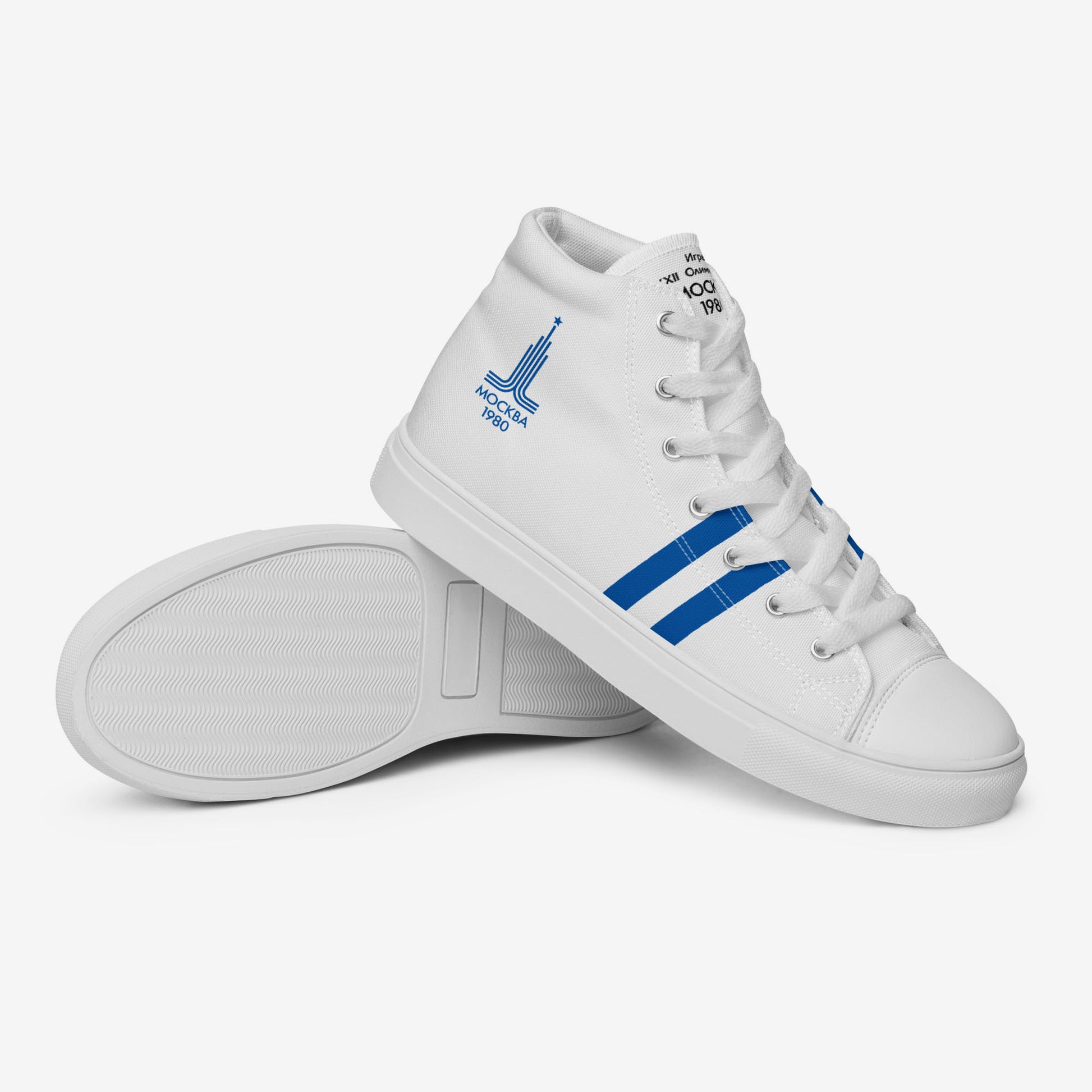 Womens Moscow 1980 Olympic Games high-top shoes with vintage navy graphics on white canvas, featuring the Olympic emblem and retro stripes.