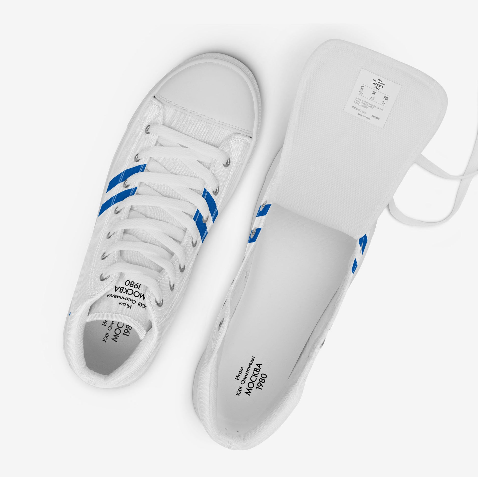 Womens Moscow 1980 Olympic Games high-top shoes with vintage navy graphics on white canvas, featuring the Olympic emblem and retro stripes.