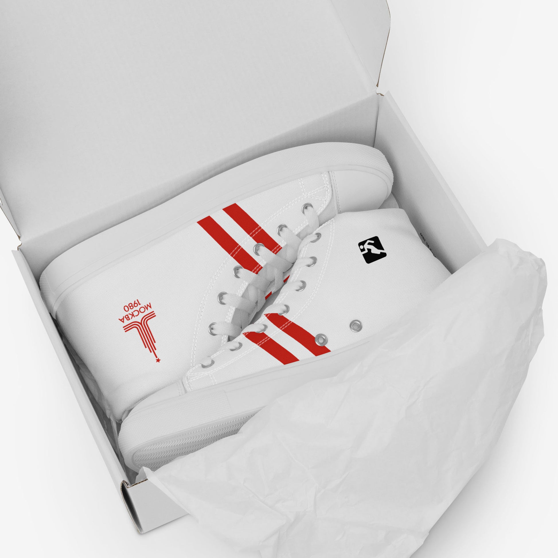 Womens Moscow 1980 Olympic Games high-top shoes with vintage navy graphics on white canvas, featuring the Olympic emblem and retro stripes.
