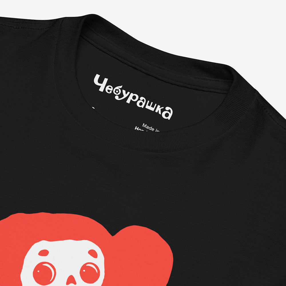 Youth T-shirt featuring Soviet cartoon character Cheburashka with flowers, with チェブラーシカ text in Japanese