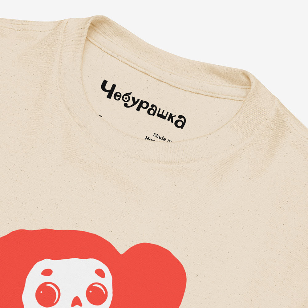 Youth T-shirt featuring Soviet cartoon character Cheburashka with flowers, with チェブラーシカ text in Japanese